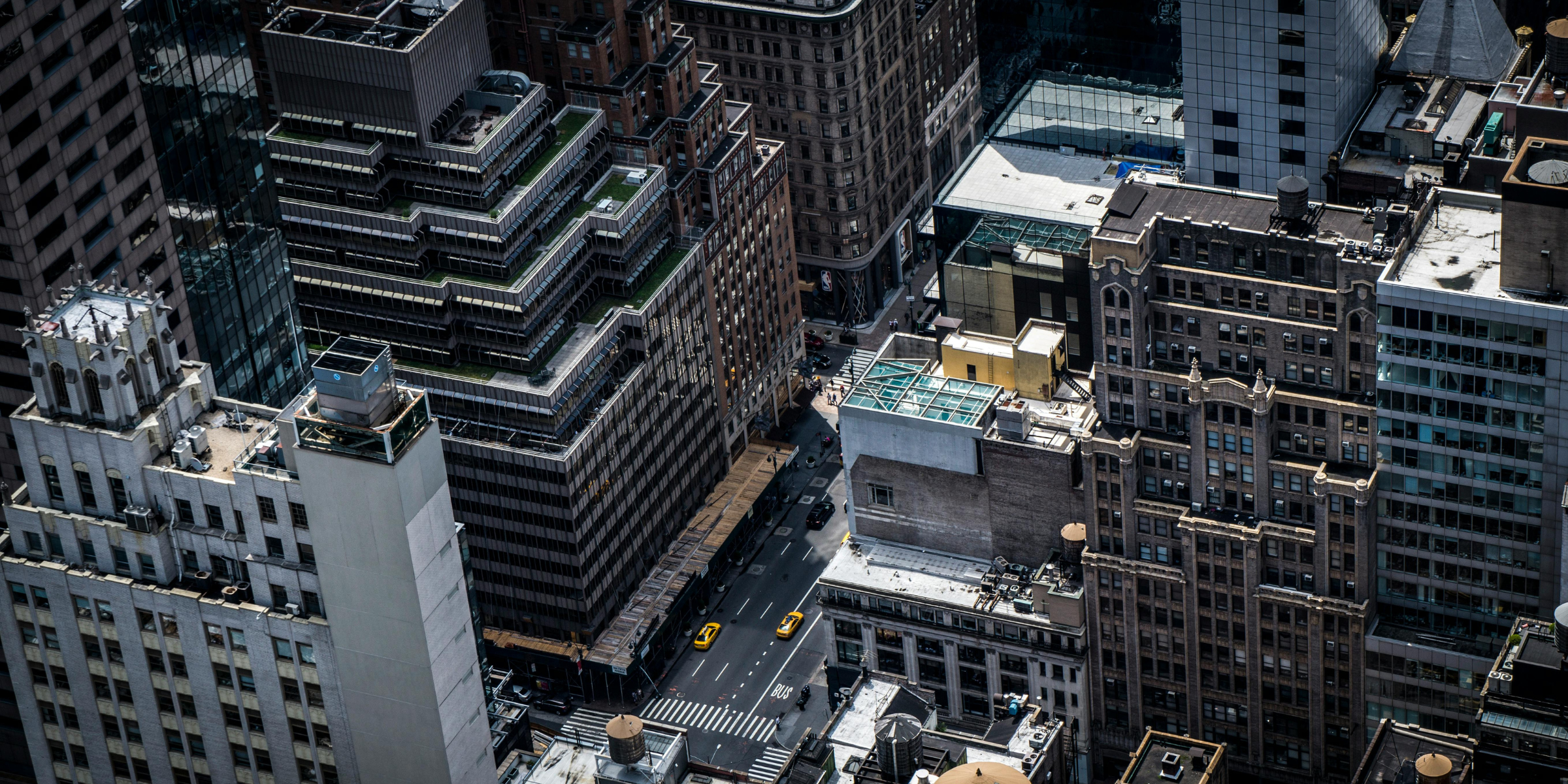 Drone Shot Overview of a City featuring roads, skyscrapers and buildings